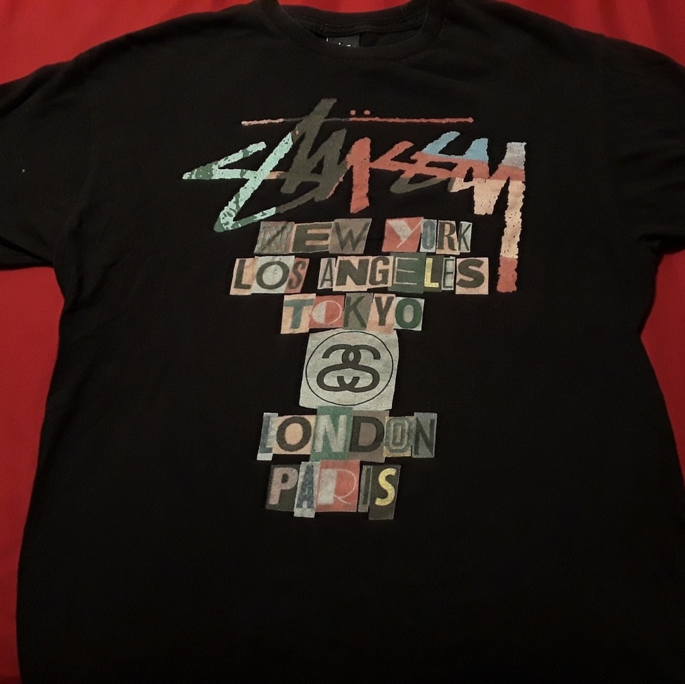 Vintage Stussy brand tshirt black in color
